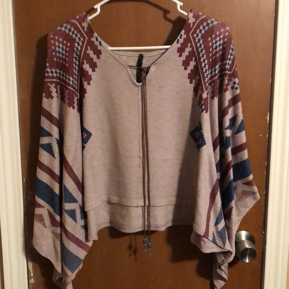 Beautiful shirt. You can wear a tank top over it